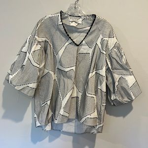 Hunter Powell, black and white blouse